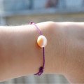 Bracelet cordon violet avec perle rose - Tikopia